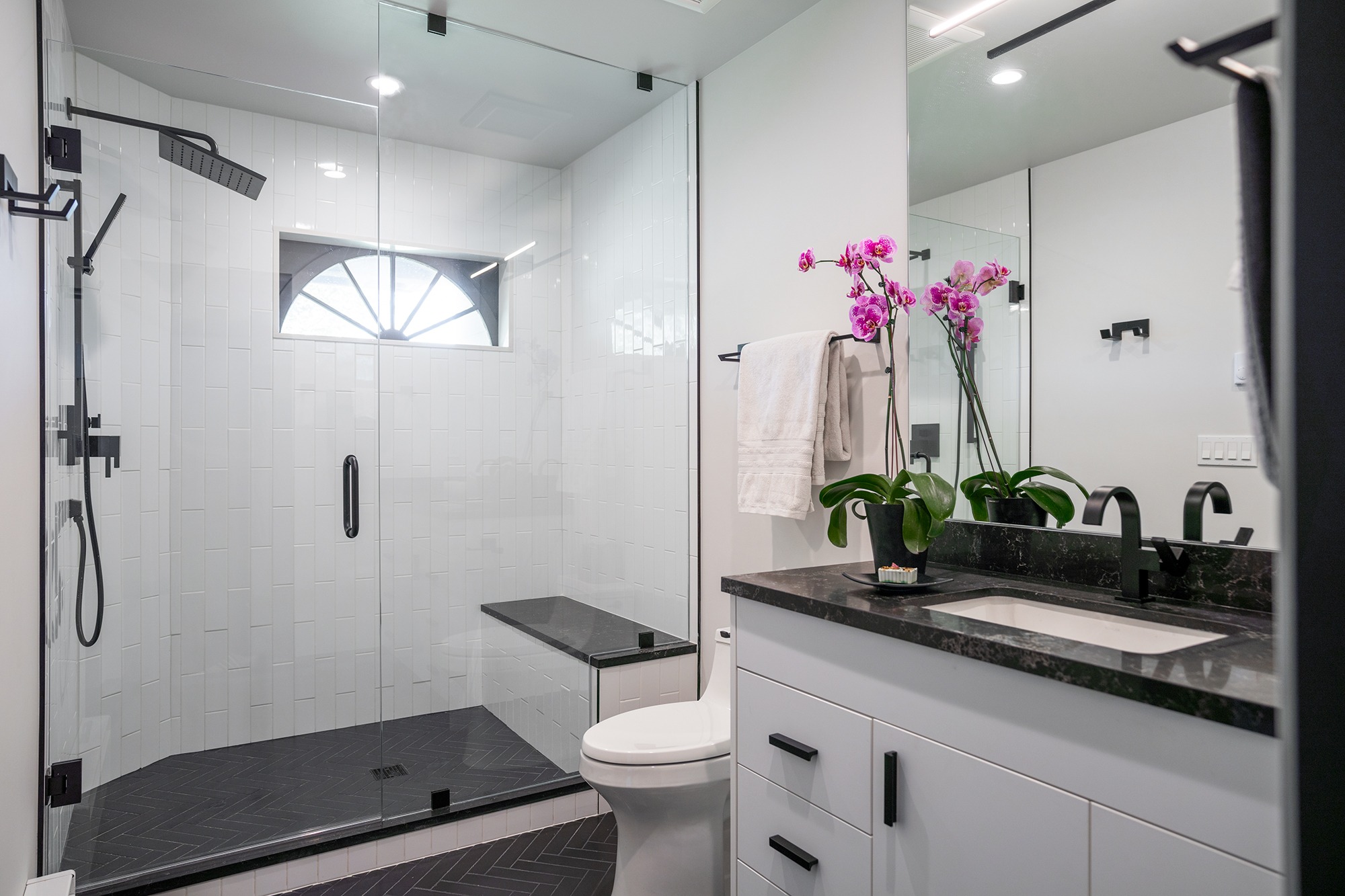Singletree Townhome Remodel -master bath photo with b&w tile and fixtures