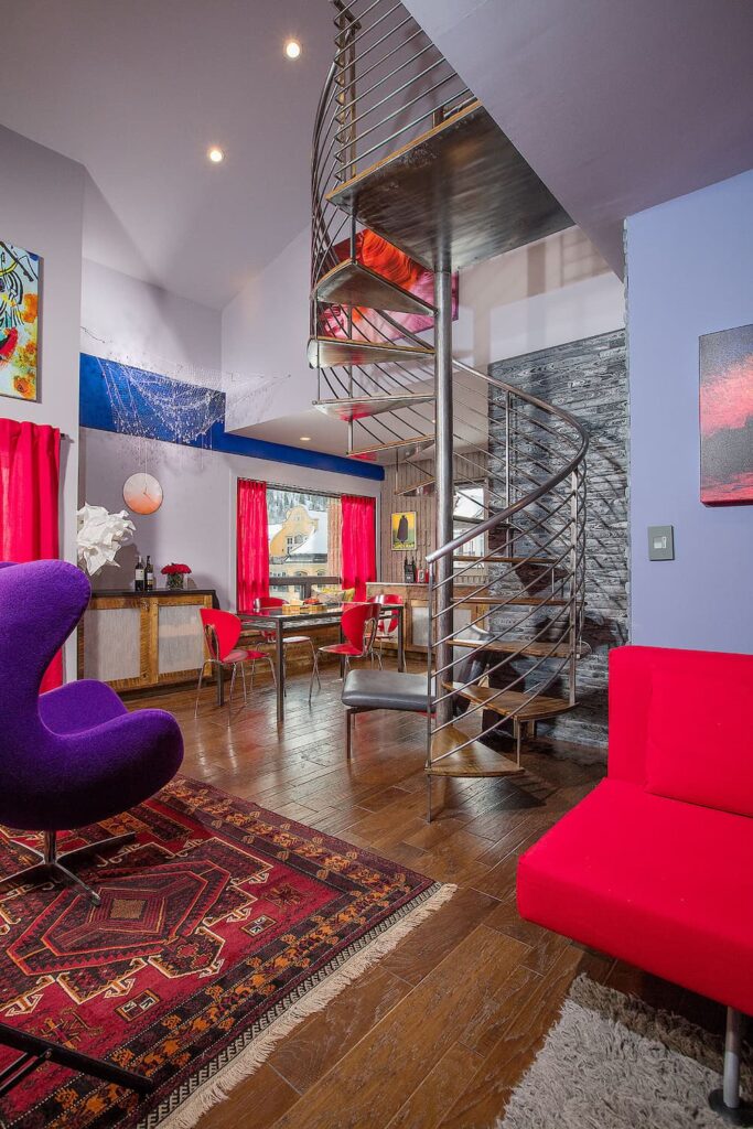 Colorfun living room featuring a spiral stair 